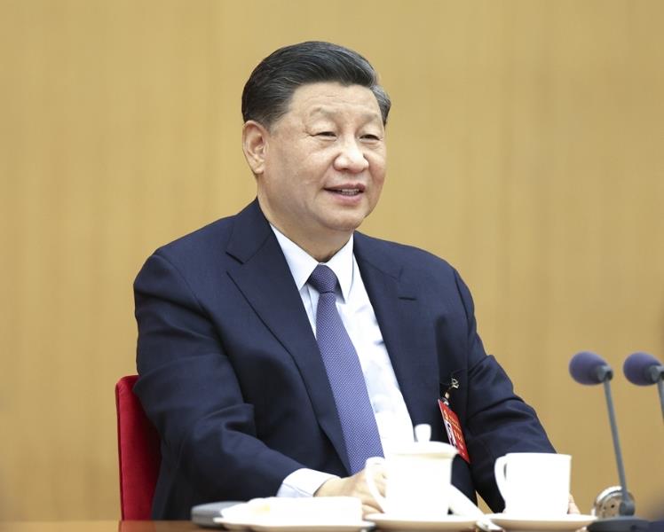 10月17日，習(xí)近平同志參加黨的二十大廣西代表團討論。新華社記者 鞠鵬 攝